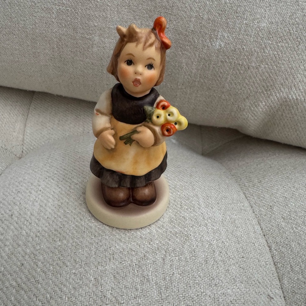 Charming Figurine with Flowers